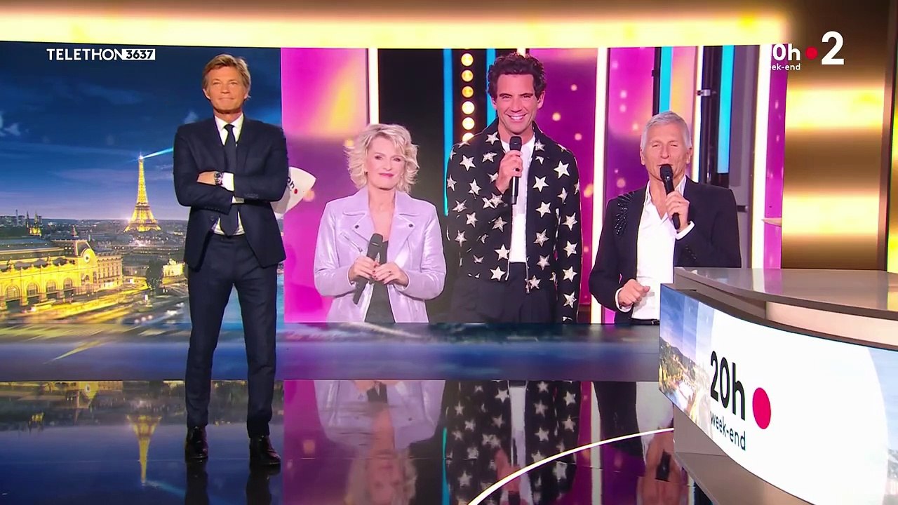 Laurent Delahousse échange avec Mika, Nagui et Sophie Davant pour le Téléthon dans le JT de 20h de France 2