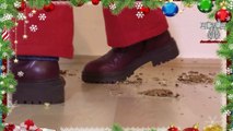 Santa NutCracker 1 - crushing walnuts with Santa's boots