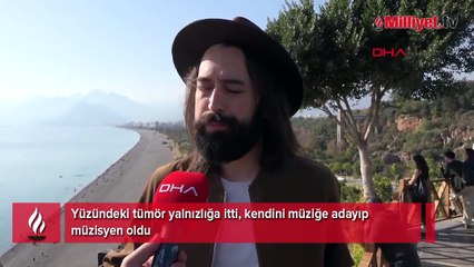 Yüzündeki tümör yalnızlığa itti, kendini müziğe adayıp müzisyen oldu