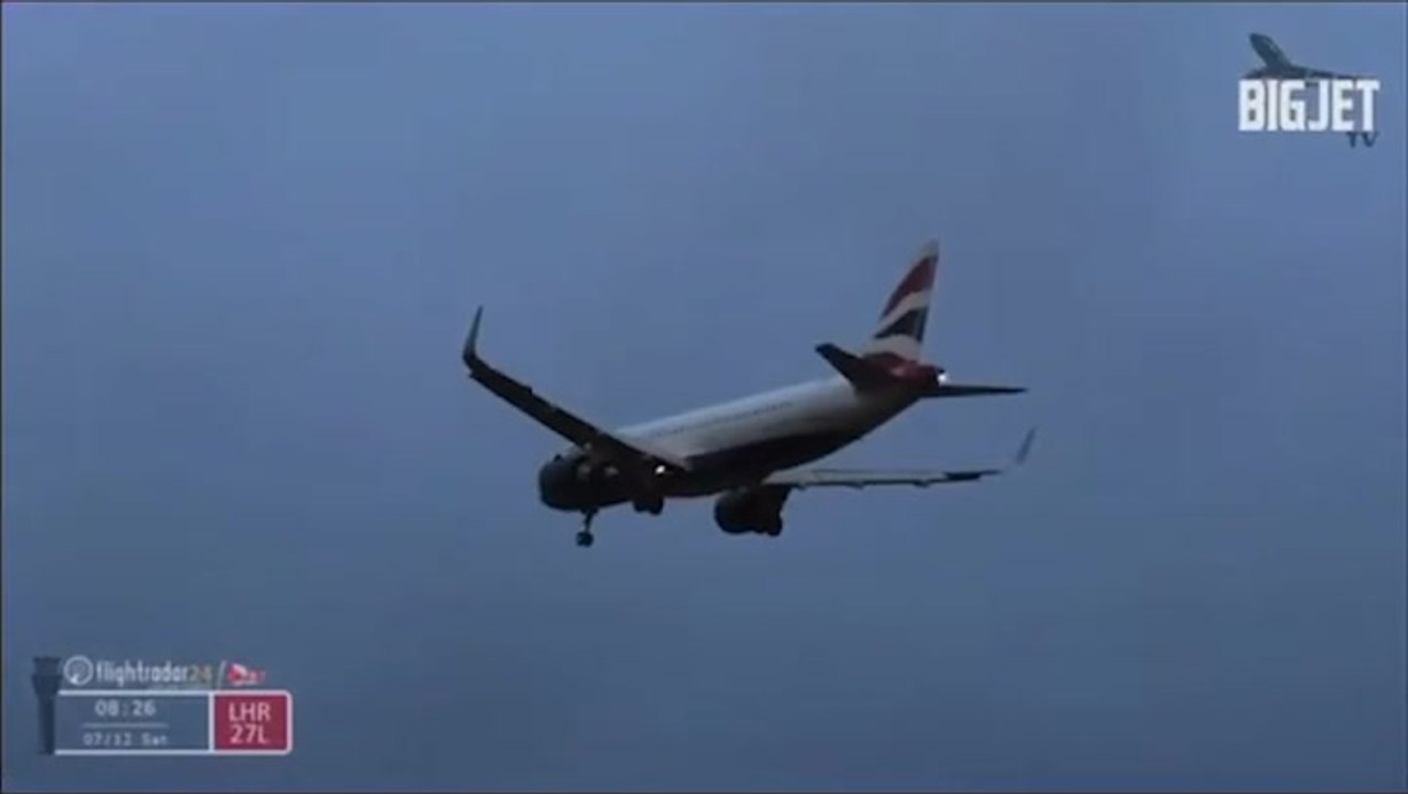 Plane struggles to land at Heathrow Airport as...