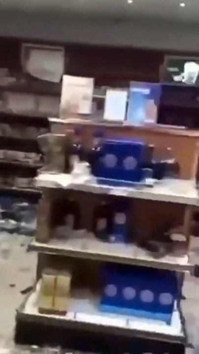 Syrian rebels smash alcohol at Aleppo Airport