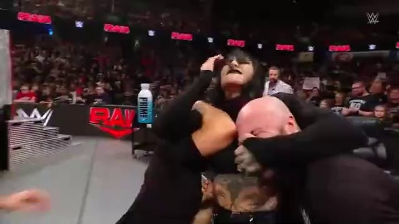 Rhea Ripley burst eye on a table. (Raw highlights 2/12/2024)