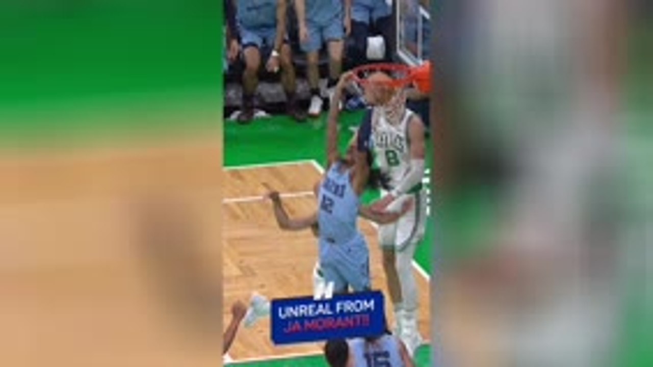 Ja Morant with an UNREAL double-clutch reverse slam