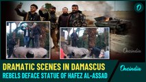 VIDEO | Rebels Deface Hafez al-Assad’s Statue, Remove Bashar’s Portrait As Damascus Falls