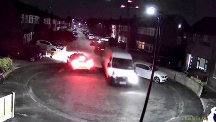 Surveillance and bodycam shows suspect ramming van at an officer (video)