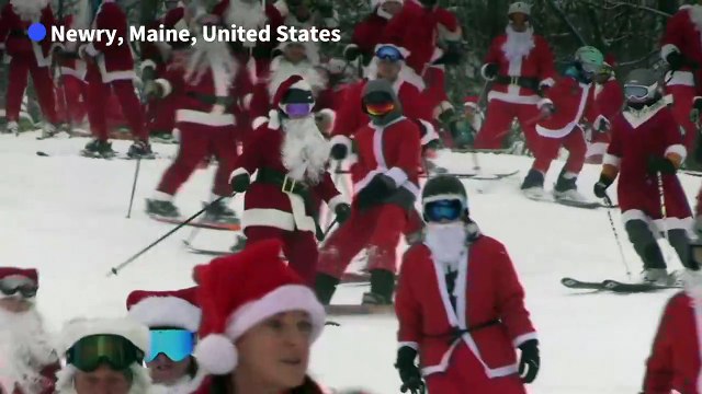 Hundreds of Santas ski in Maine to raise money