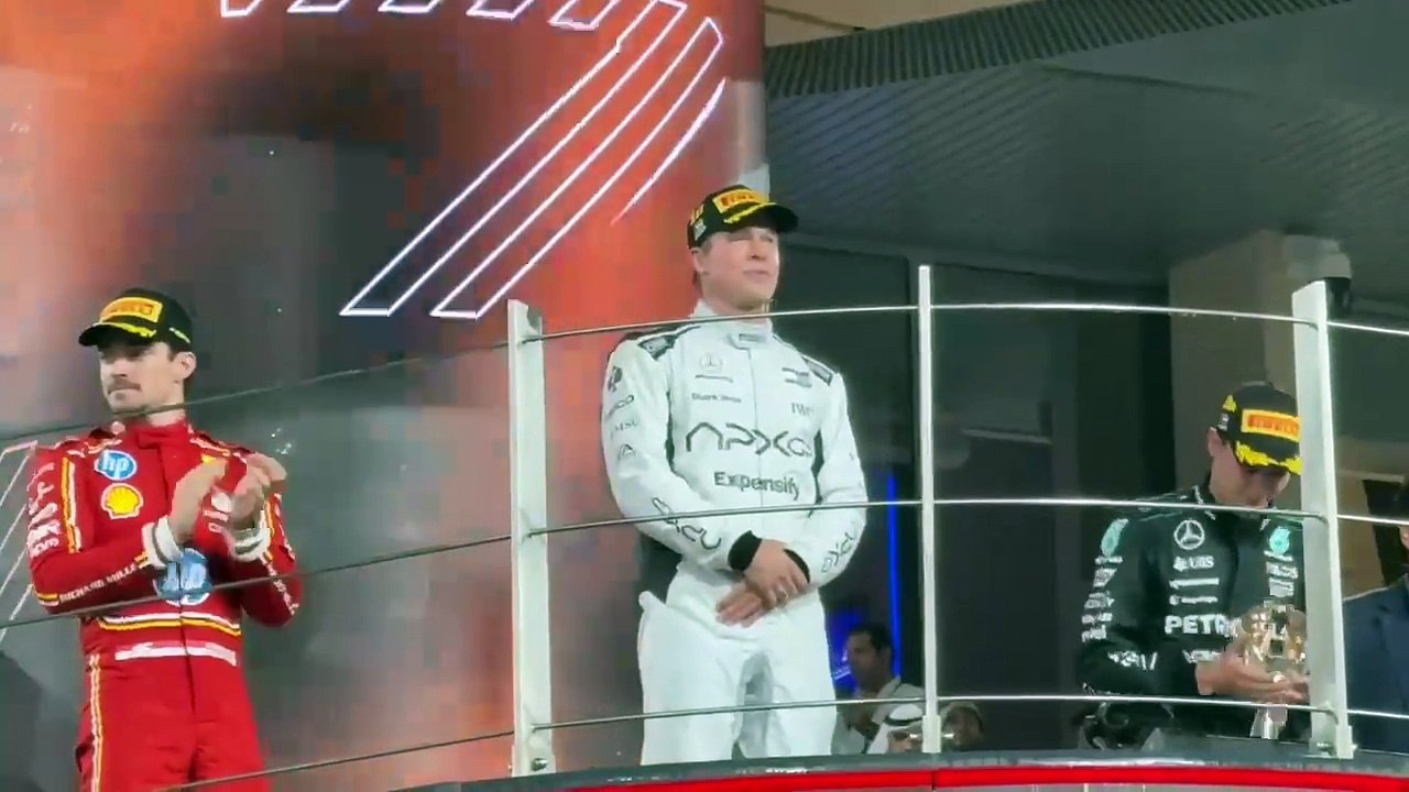 Brad Pitt shares Formula 1 podium with Charles...
