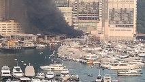 Dramatic footage of firefighters tackling major shipyard blaze in Hong Kong