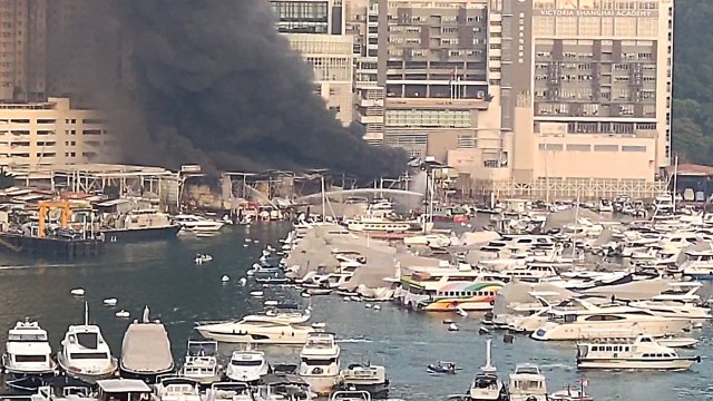 Dramatic footage of firefighters tackling major shipyard blaze in Hong Kong