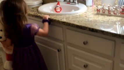 Little girl gets mad when she sees elf taking a bath with her ducks