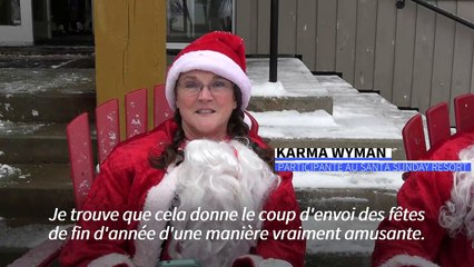 Etats-Unis: des centaines de Pères Noël skient pour la bonne cause
