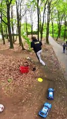 People are doing remote control Rally car races in the park!