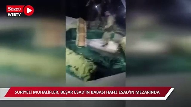 Suriyeli Muhalifler, Beşar Esad'ın babası Hafız Esad'ın mezarında
