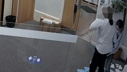 Moment receptionist disarms self-proclaimed Nazi carrying six-inch knife