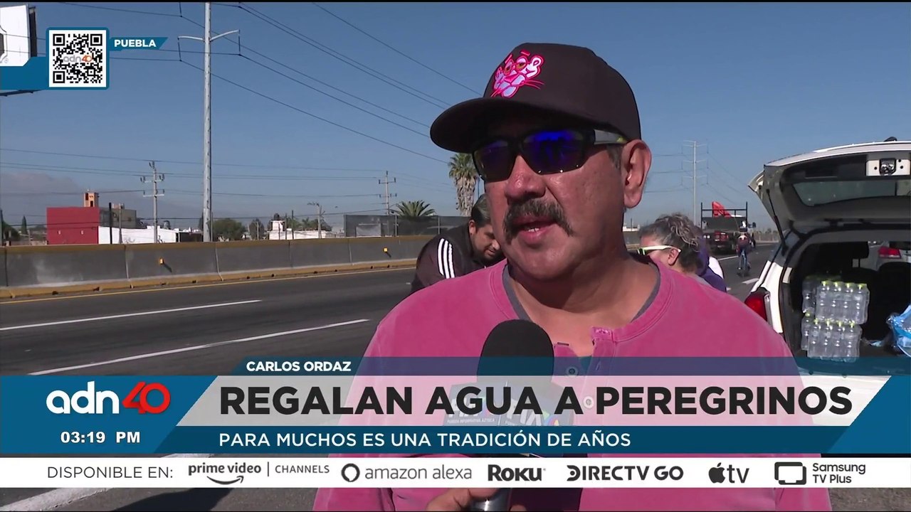 En agradecimiento a la virgen de Guadalupe, regalan agua y comida a peregrinos