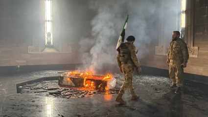 Tomb of Bashar al-Assad’s father engulfed in flames as rebels set fire to mausoleum