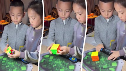 Junges Duo löst gemeinsam Zauberwürfel in nur 9 Sekunden