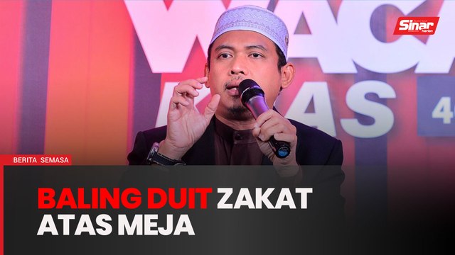 Ada yang baling duit atas meja bagi zakat