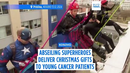 Superheroes deliver festive gifts to young Kosovo cancer patients at Pristina hospital