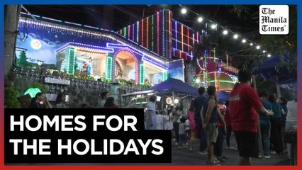 Manila sparkles with Christmas lights on homes, buildings