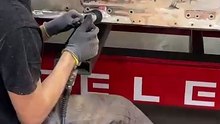 Tesla Model X side repair on Celette bench by Carrosserie Lecoq