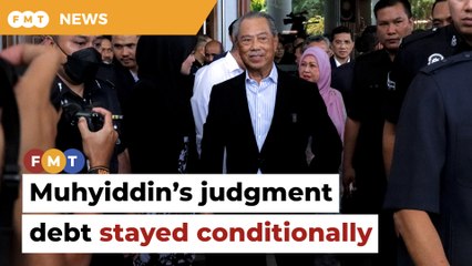 Muhyiddin’s judgment debt to Guan Eng stayed conditionally