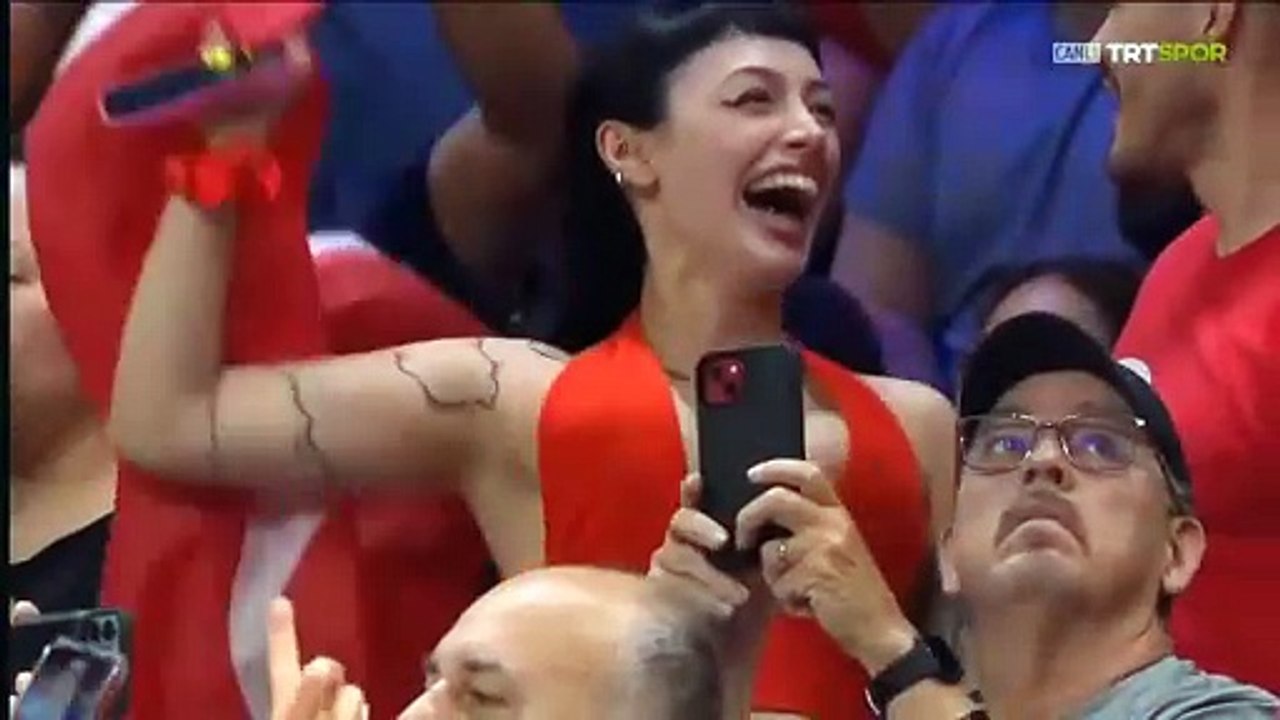 A beautiful black-haired woman gets excited while watching sports!  ...Oh?