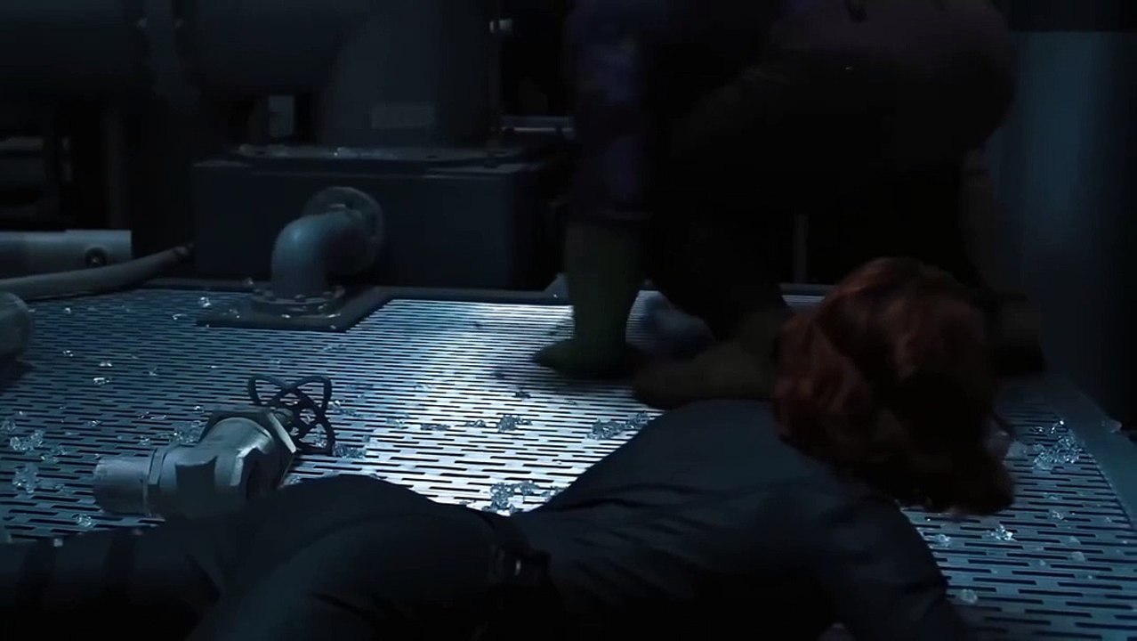 Unleashing Fitness Goals- Woman's Intense Gym Workout in a Dimly Lit Room ..