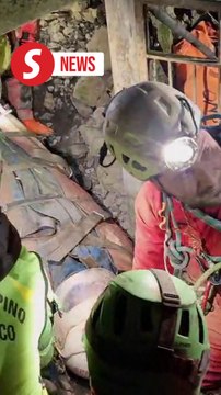 Injured Italian cave explorer rescued after three days trapped 8m underground