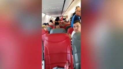In-Flight Brawl Erupts as Passenger Bites Fellow Holidaymaker on Neck ✈️