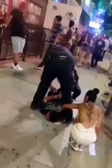 Couple try to snatch a suspects gold chain during his arrest