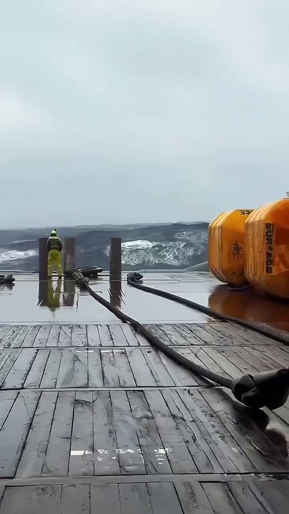 Sea waves chasing a Ship crew -