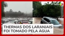 Temporal causa alagamentos e deixa carros submersos em parque aquático no interior de SP