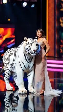 A woman performs a fusion with the white tiger #americagottalent #magic #shorts #hybrids#hybrid #americagottalentextreme #scienc #fascinating #mindblowingcreatures #differentspecies #animals #incredible #amazing #evolution #animalfusion #short