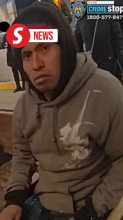 Sleeping woman set on fire on New York subway train