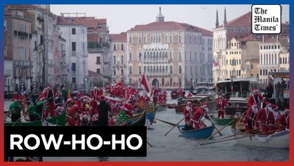 Santas take over Venice's canals
