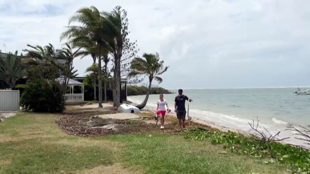 Queenslanders preparing for cyclone Alfred, as authorities continue search for Lithuanian rower lost in Coral Seas