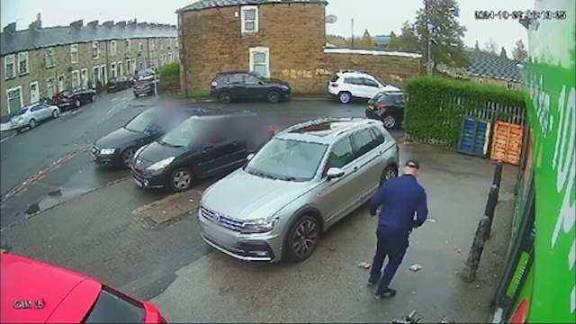 CCTV captures moment man caught carrying 'gun' after bending over to pick up packet of crisps in Lancashire