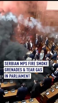 Serbian MPs fire smoke grenades and tear gas in parliament
