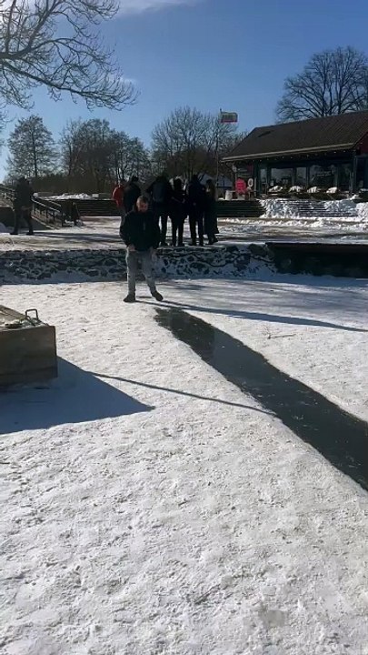 Epic ice fall: Man slips on ice while sliding and cracks the surface