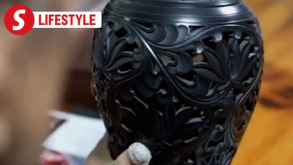 Father-son duo take ancient black pottery global