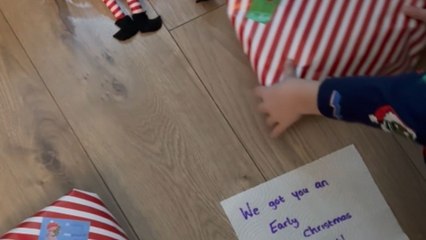 Naughty elves prank little girls with their uniforms wrapped as early Christmas present