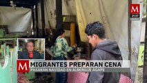 Migrantes en Tijuana celebran la víspera de Navidad con birria de pollo en el albergue Ágape