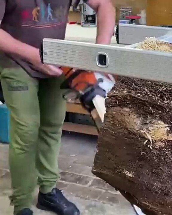 Sawing wood with a gasoline saw #wood #carpenter #woodworking