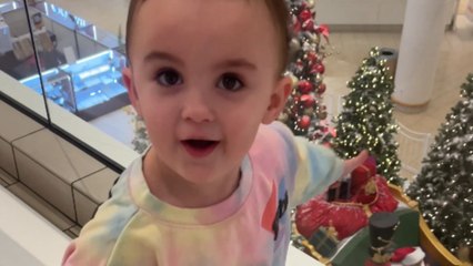 Little girl’s Christmas spirit shines bright as she spots Santa in the mall