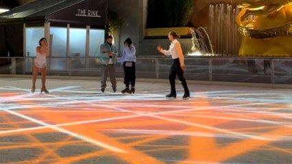 Love sparkles as gentleman proposes on The Rink under Rockefeller Christmas tree