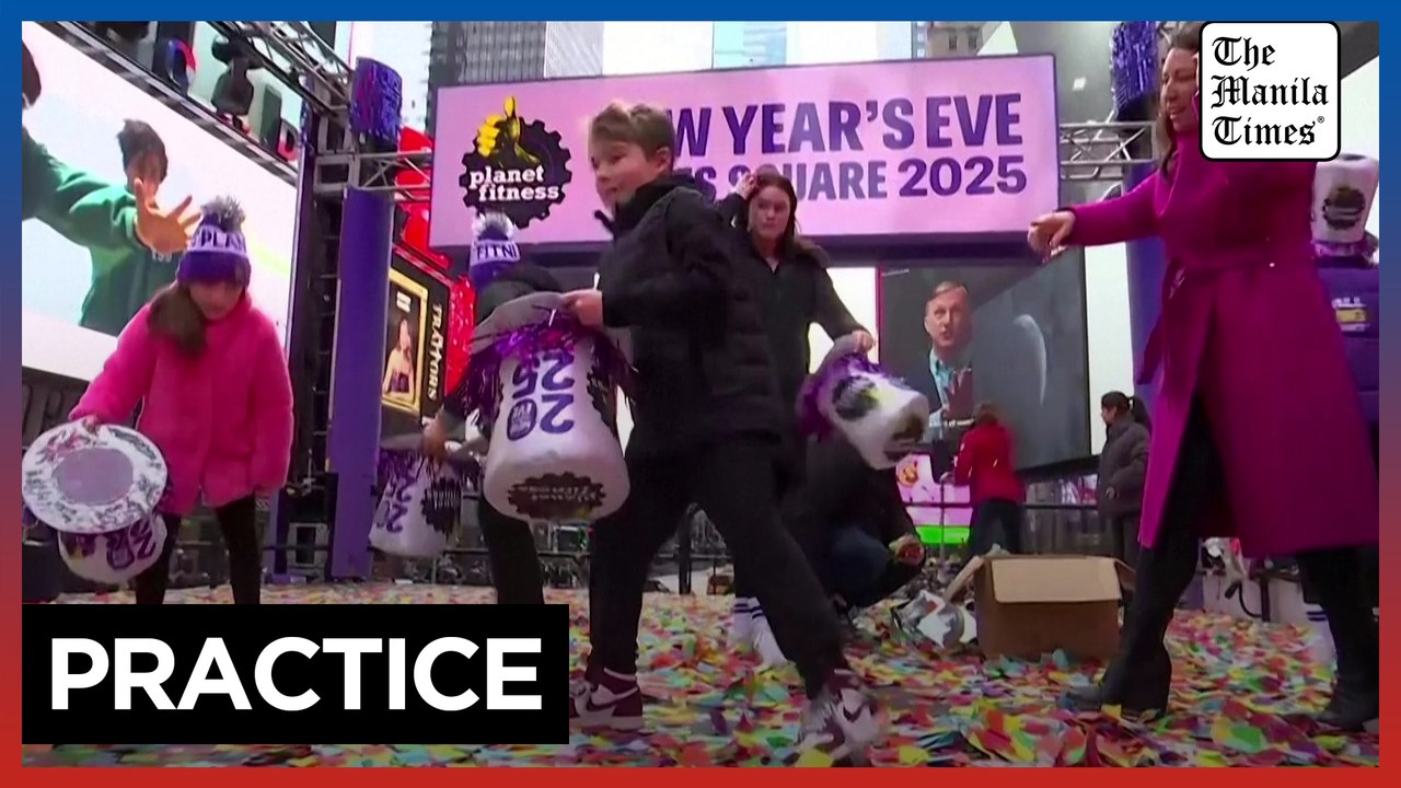 Crowds gather to 'test' confetti in Times Square ahead of New Year's Eve