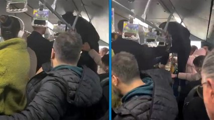 Metrobüste boş koltuk kavgasında aracın tutunma demirine tırmanıp yumruk attı!