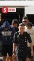 Duo charged in KL with robbing three people, including Russian woman