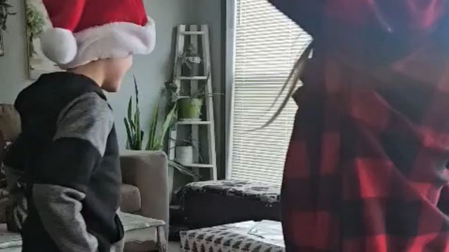 Heartfelt reaction: Little boy can't hold back tears after unwrapping his Christmas gift